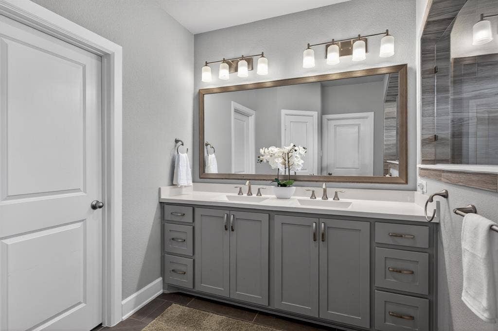 6301 Millie Way, McKinney, TX 75070 Elegant bathroom with functional layout beautiful finishes