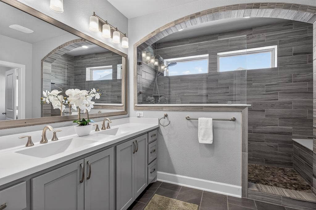 6301 Millie Way, McKinney, TX 75070 Spacious primary bath featuring a large walk-in shower and a relaxing, spa-like atmosphere.