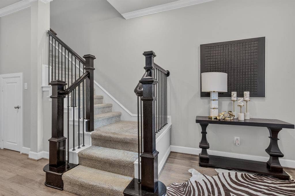 6301 Millie Way, McKinney, TX 75070 View of foyer and staircase leading to second floor