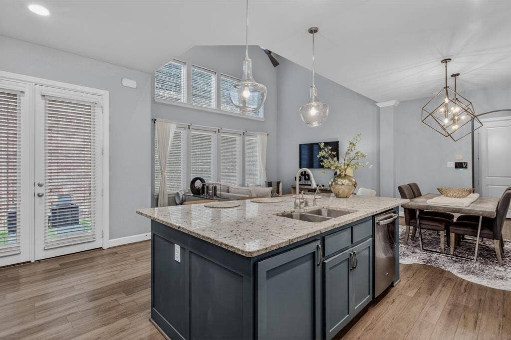 6301 Millie Way, McKinney, TX 75070 Open-concept kitchen overlooking living and dining areas