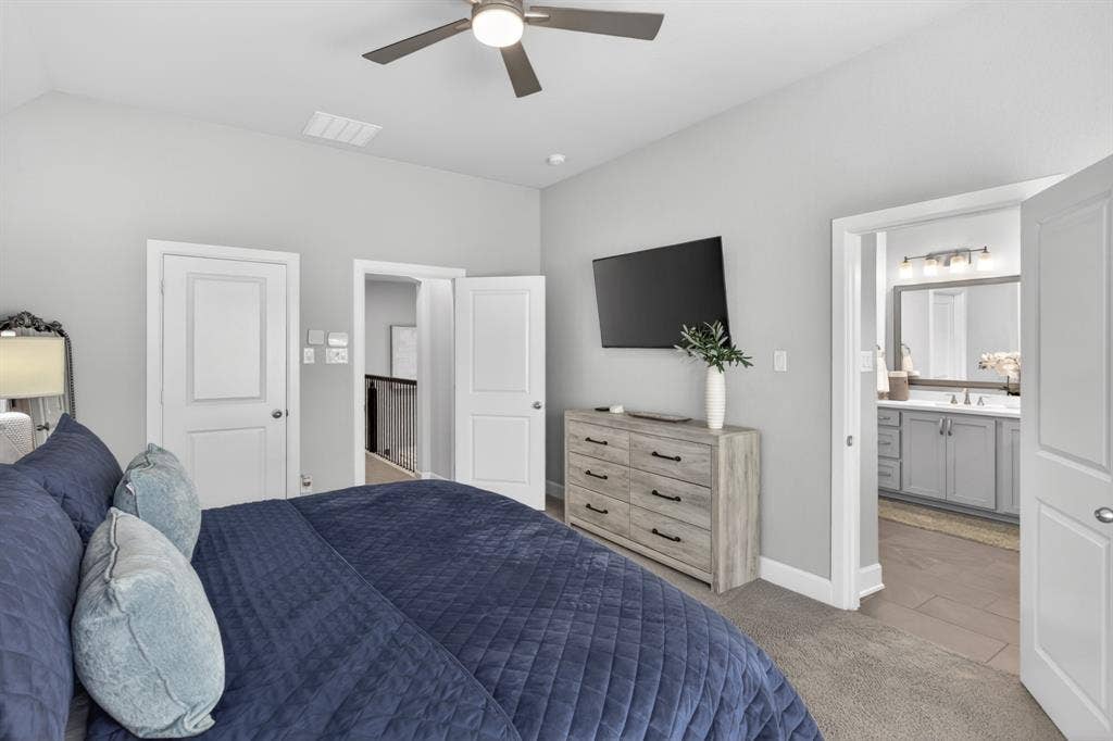 6301 Millie Way, McKinney, TX 75070 View of primary bedroom leading to primary bath.