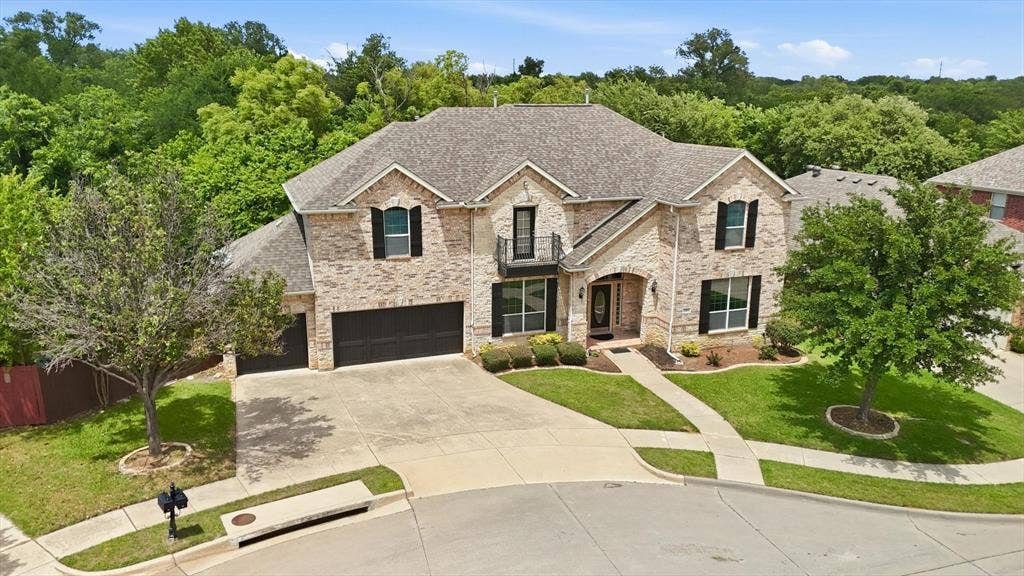 201 Fountainview Drive, Euless, TX 76039 Aerial view of expansive home.