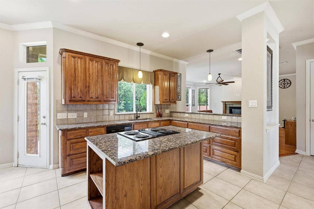 201 Fountainview Drive, Euless, TX 76039 Chefs kitchen features plenty of counter and cabinet space.