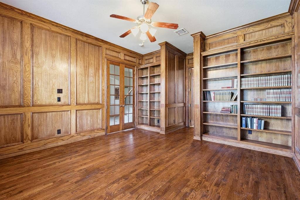 201 Fountainview Drive, Euless, TX 76039 Stunning real hardwood flooring, wainscoting, large walk-in closet, full private bath.