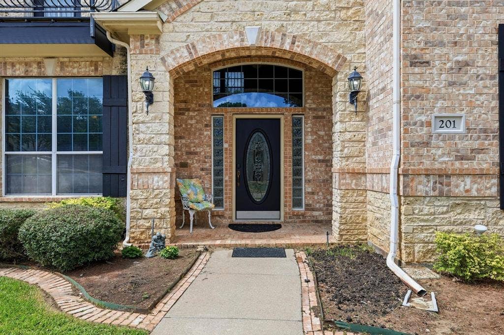 201 Fountainview Drive, Euless, TX 76039 Stunning front door approach welcomes all guests.