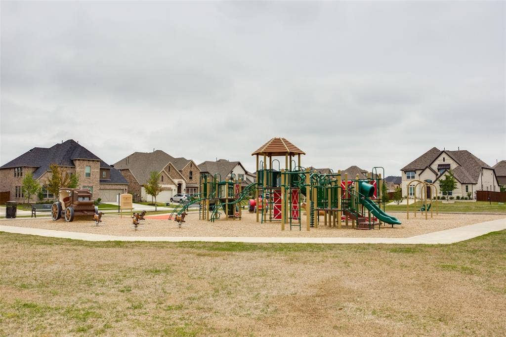 2811 Killdeer Trail, Prosper, TX 75078 Community playground featuring a lawn and a residential view