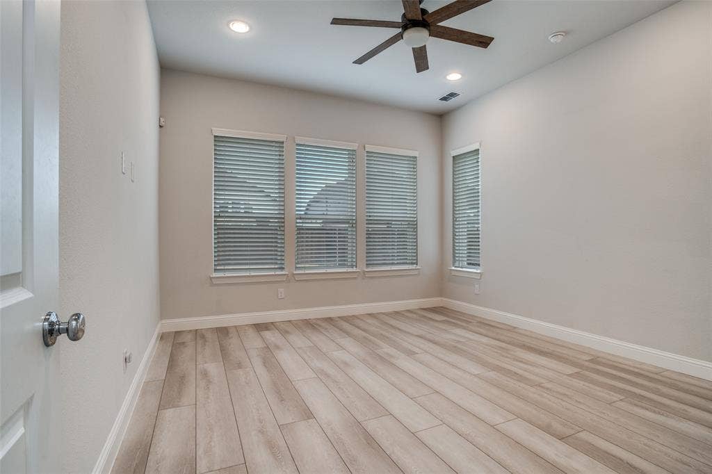2811 Killdeer Trail, Prosper, TX 75078 Unfurnished room with light wood-style flooring, a ceiling fan, and recessed lighting