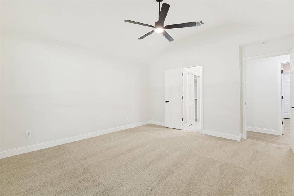 713 Bridgewater Lane, Mesquite, TX 75181 Neutral-toned carpet flooring and white baseboards