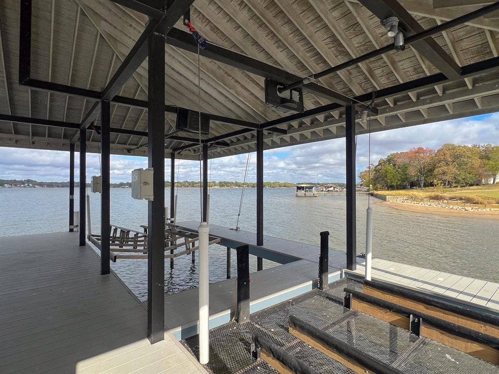 6001 Melba Drive, Malakoff, TX 75148 Dual PWC lift and boat lift with cradle, plus dock whips.