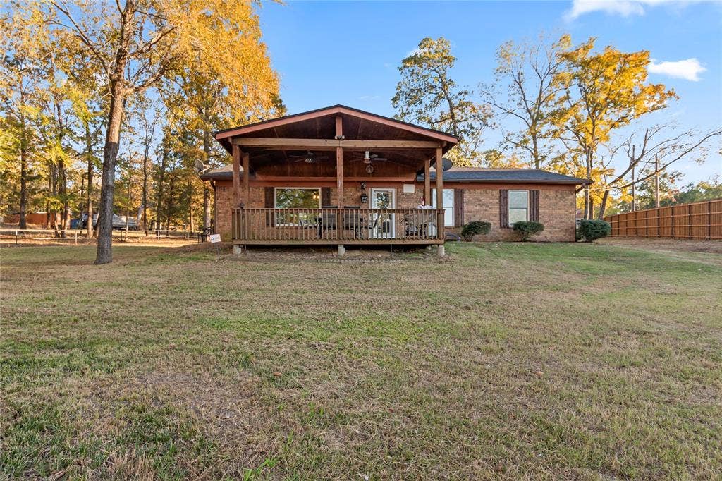 6001 Melba Drive, Malakoff, TX 75148 Cozy cabin for weekend retreat or live here while building your dream lakehouse and then use for guest quarters. Covered deck ideal for outdoor entertaining.