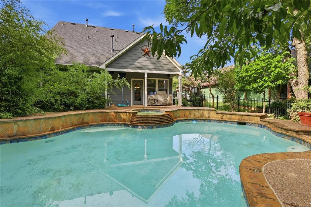 413 Collins Street, Argyle, TX 76226 Heated inground pool with integrated spa and stone coping