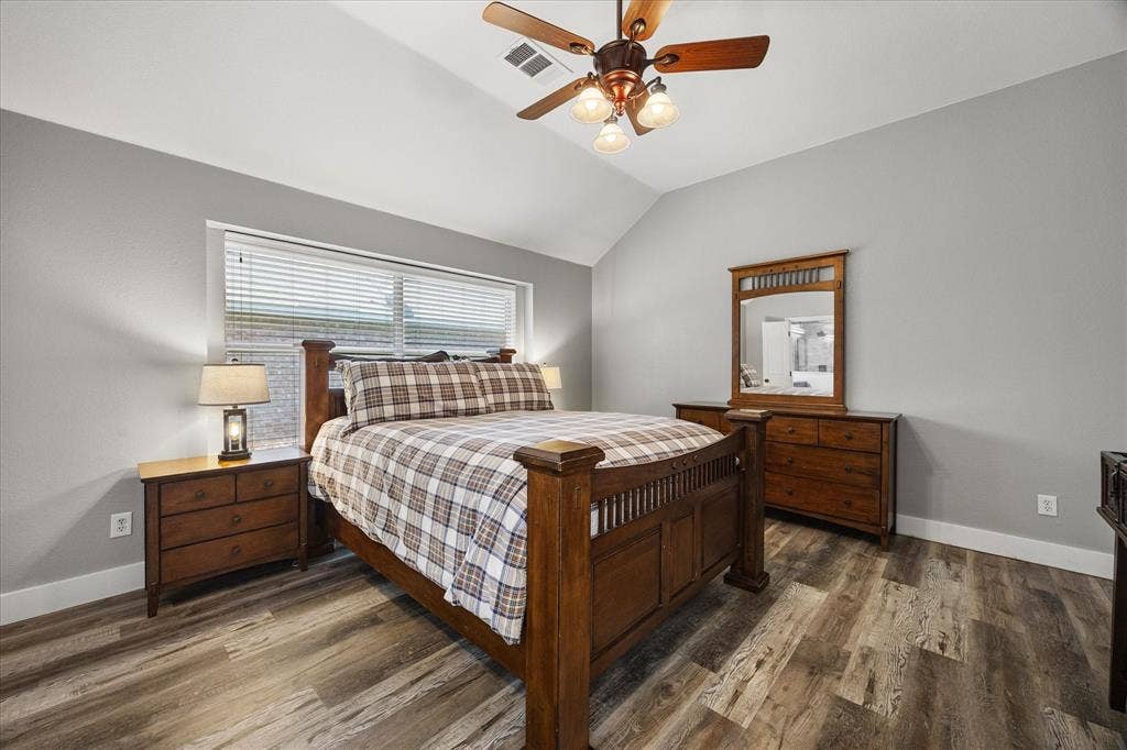 The spacious primary suite is split for privacy.