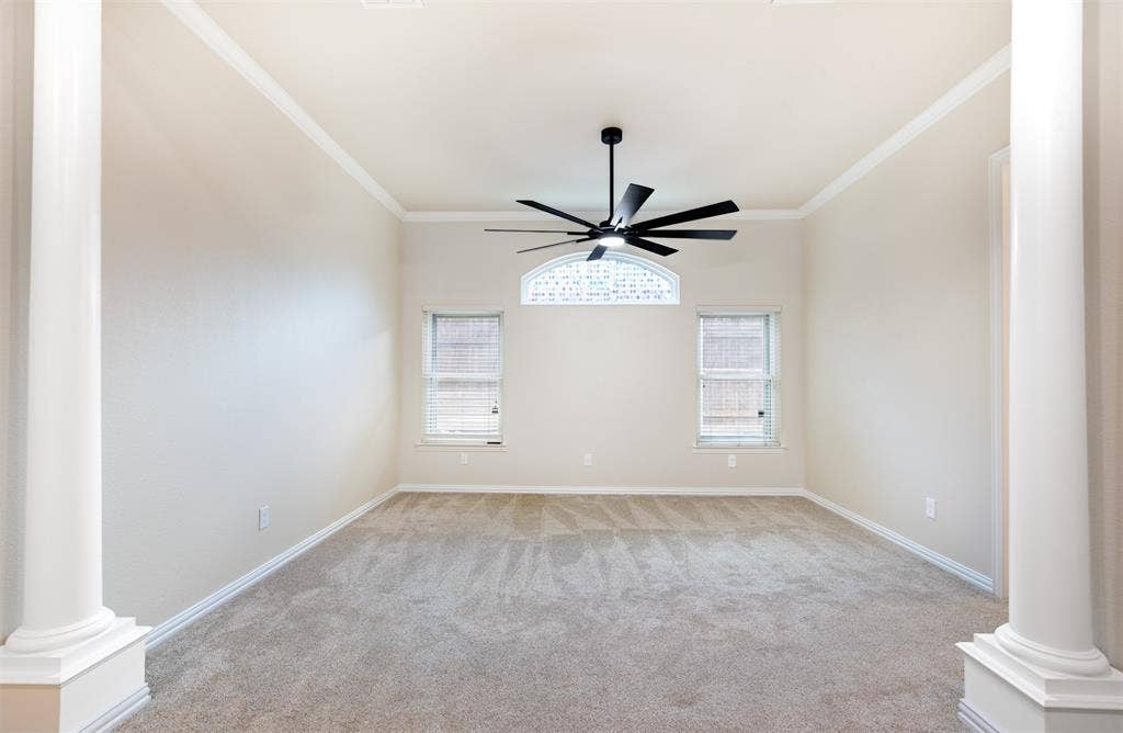 1405 Faringdon Drive, Plano, TX 75075 Grand primary suite with crown molding and columns.