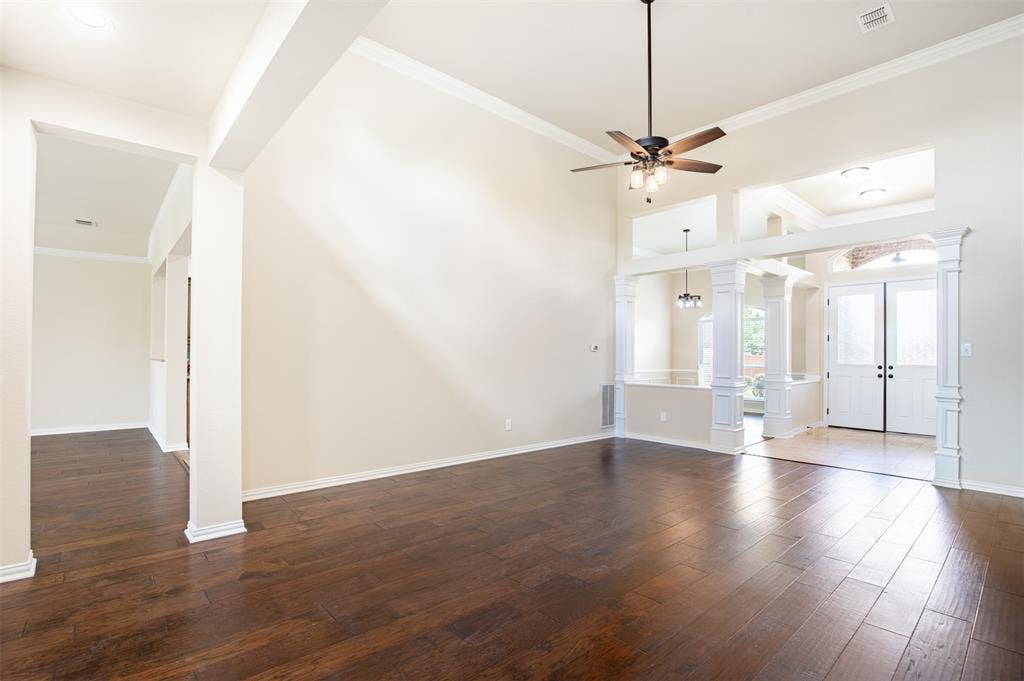 1405 Faringdon Drive, Plano, TX 75075 Living room flows seamlessly to kitchen, family room, and dining area.