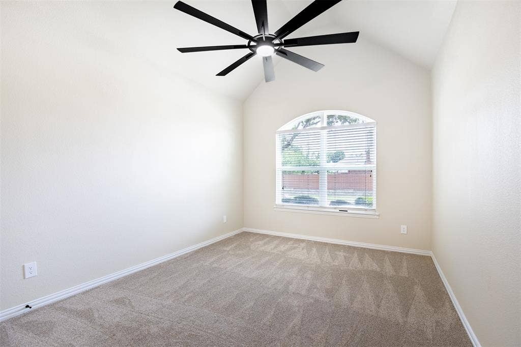 1405 Faringdon Drive, Plano, TX 75075 Secondary bedroom with vaulted ceiling.