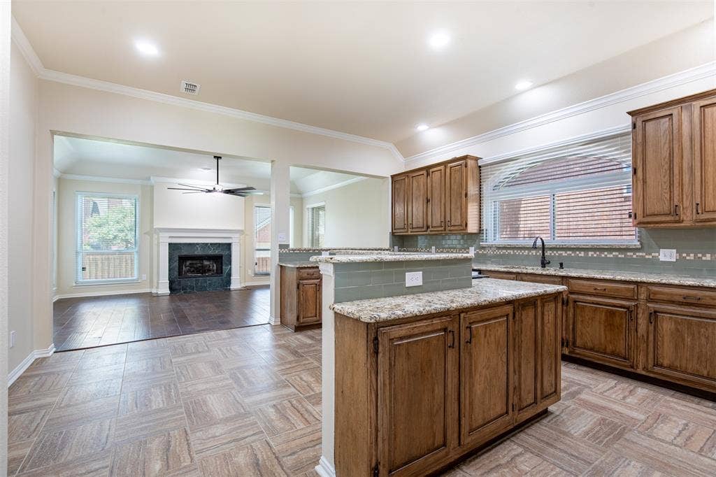 1405 Faringdon Drive, Plano, TX 75075 Kitchen features breakfast area.