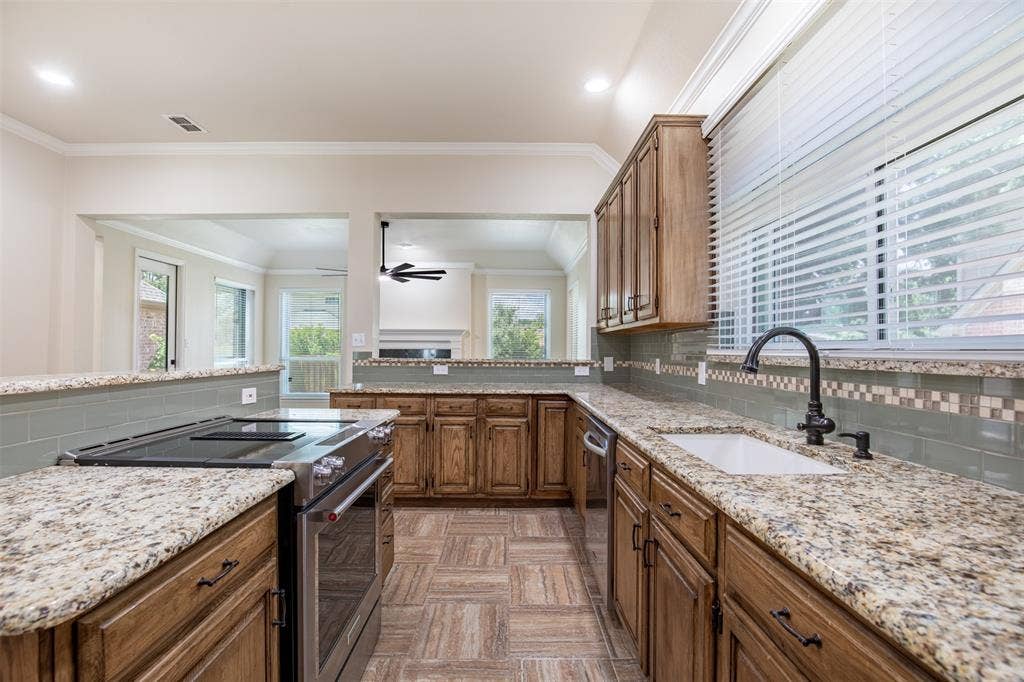 1405 Faringdon Drive, Plano, TX 75075 Kitchen with an abundance of storage.