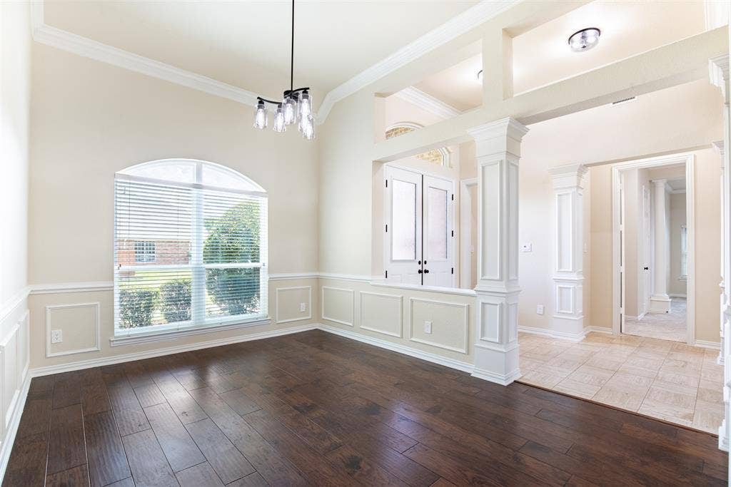 1405 Faringdon Drive, Plano, TX 75075 Dining room with crown molding and updated lighting.