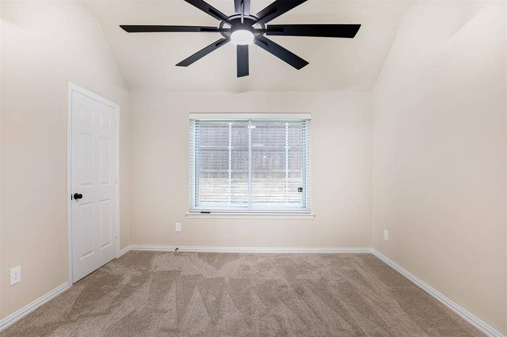 1405 Faringdon Drive, Plano, TX 75075 Secondary bedroom with ceiling fan.