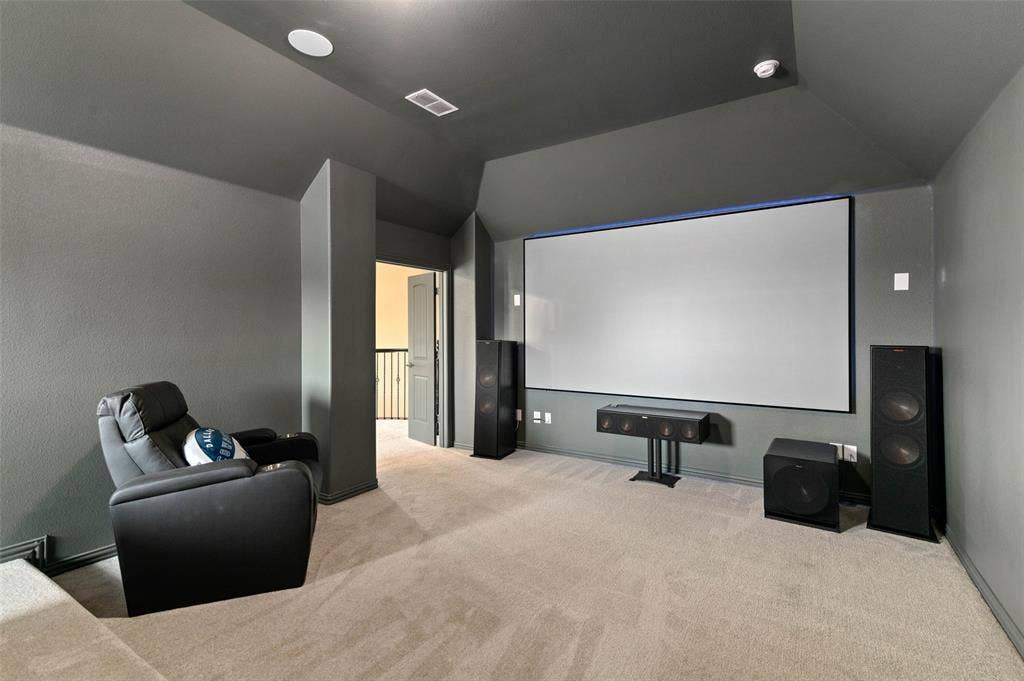 800 Beckington Drive, Shady Shores, TX 76208 Dedicated media room featuring a large projection screen, recessed lighting, and neutral-toned carpeting