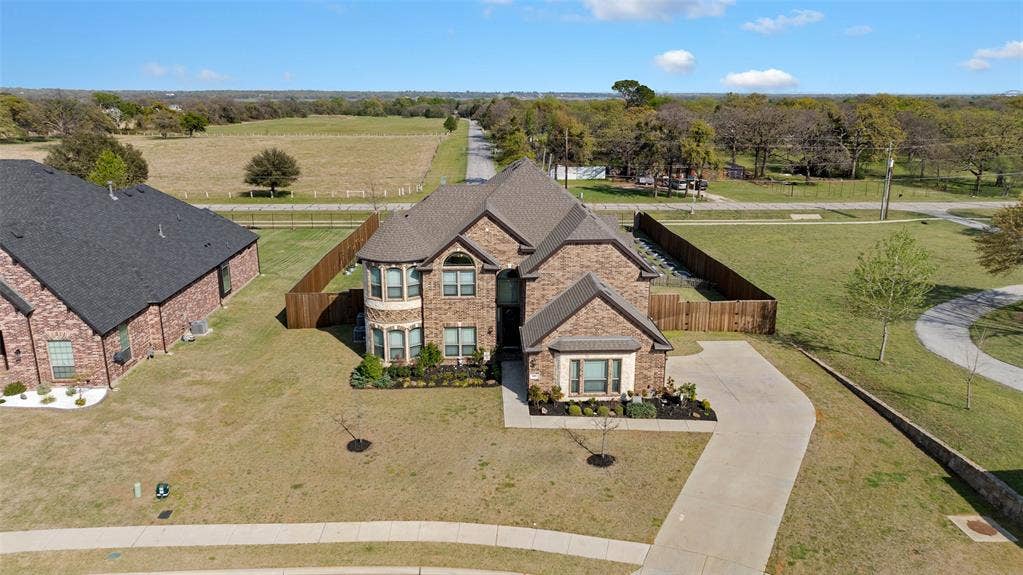 800 Beckington Drive, Shady Shores, TX 76208 Aerial view of this amazing property! Brick exterior with stone accents and a multi-level roofline