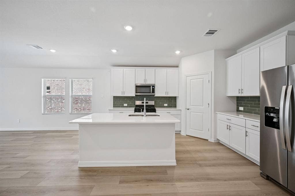 2409 Nicole Drive, Denton, TX 76208 Photo is not of the actual home, but is an inspirational photo of builder’s model home and may depict options, furnishings, and/or decorator features that are not included.