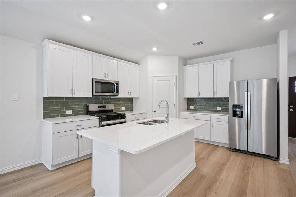 2409 Nicole Drive, Denton, TX 76208 Photo is not of the actual home, but is an inspirational photo of builder’s model home and may depict options, furnishings, and/or decorator features that are not included.