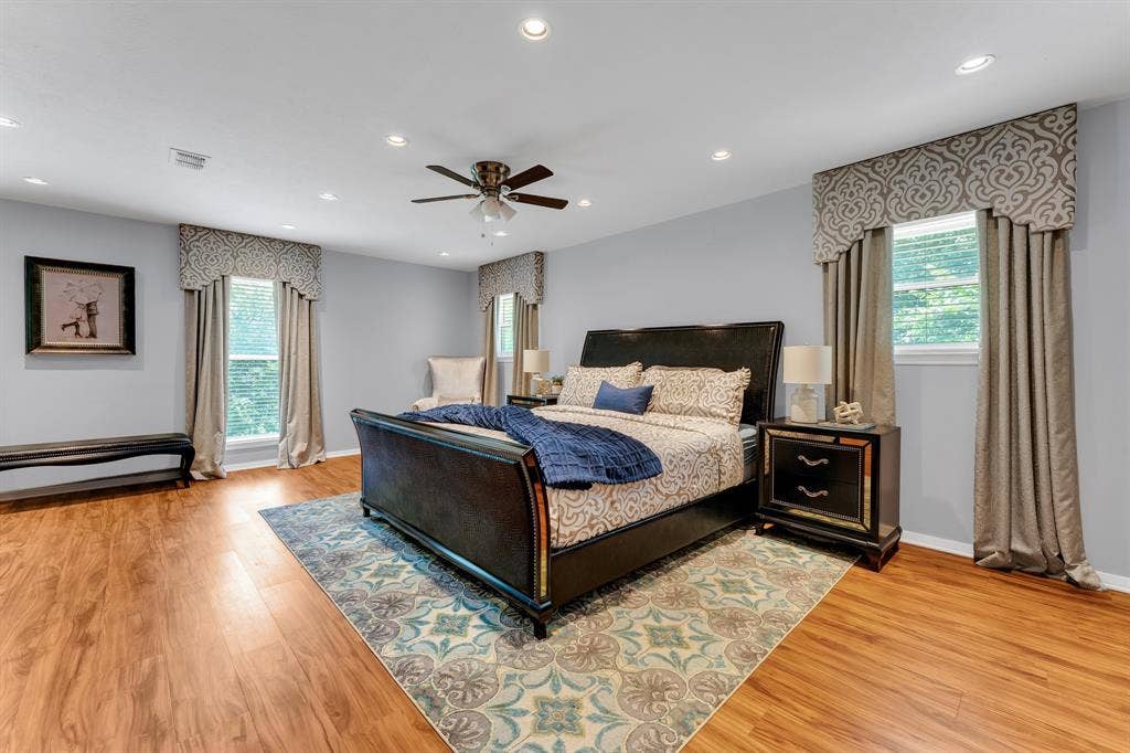3908 Wildwood, Euless, TX 76040 Spacious room featuring wood-finish flooring, recessed lighting, and a ceiling fan