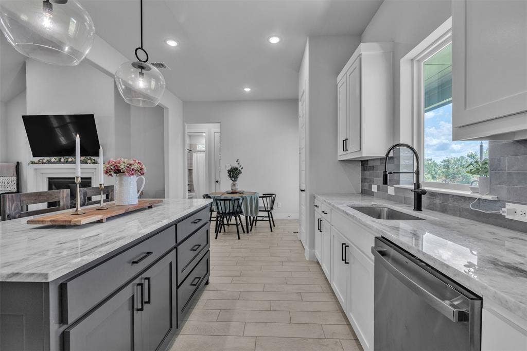 2004 Willy Dilly Road, Springtown, TX 76082 Neutral wall colors complement the light wood-finish flooring
