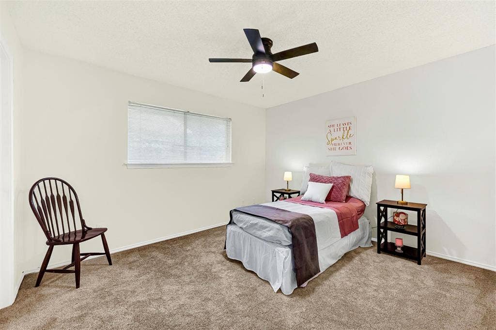 1908 Edgewater Drive, Plano, TX 75075 Middle bedroom, with large window for natural light.