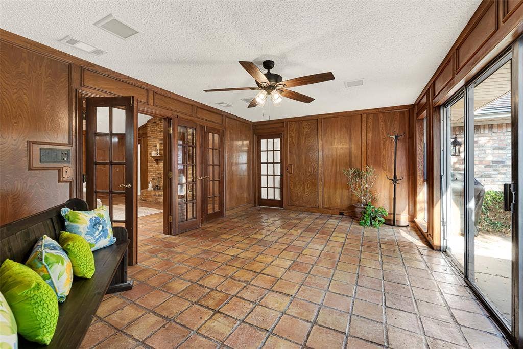 1908 Edgewater Drive, Plano, TX 75075 Right off the living room the sun room give you the opportunity to entertain with enough space for everyone.