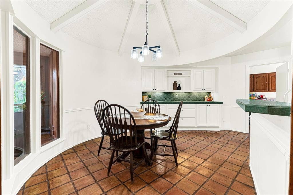 1908 Edgewater Drive, Plano, TX 75075 Breakfast area with tall ceiling makes this space feel even larger along with built ins for extra storage for entertaining, craft supplies...