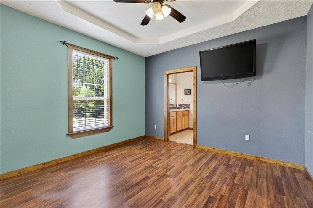 11591 Farm Market 59, Athens, TX 75751 2nd Primary Bedroom On Level 1 with an en-suite bath, oversize walk-in closet in the bath.