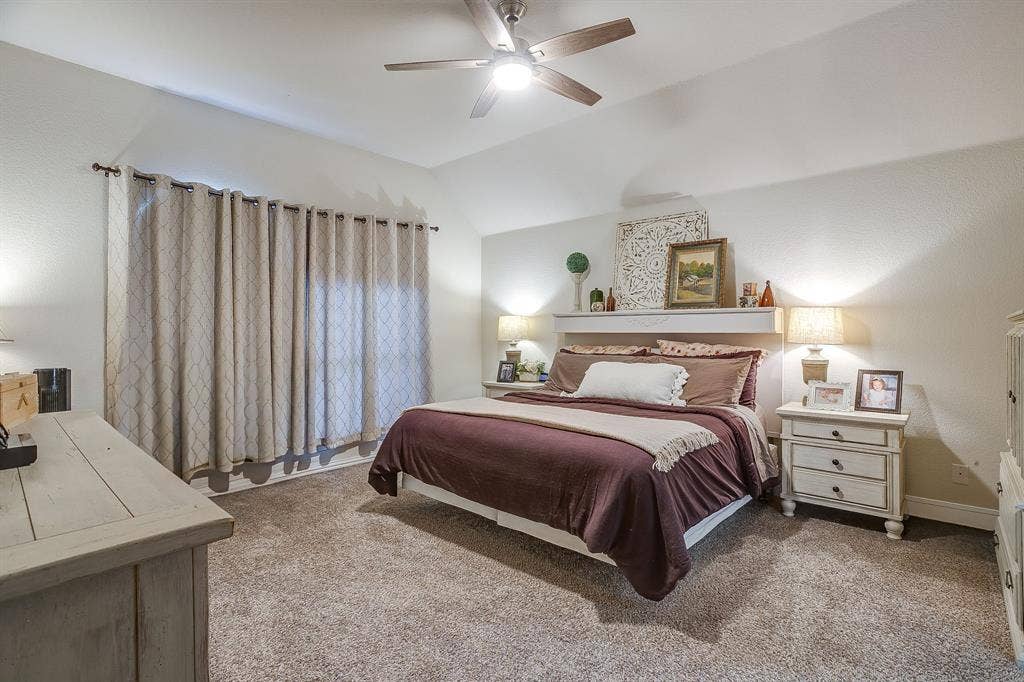 1316 Meadowlakes, Azle, TX 76020 Master suite with attached bath and raised ceilings.