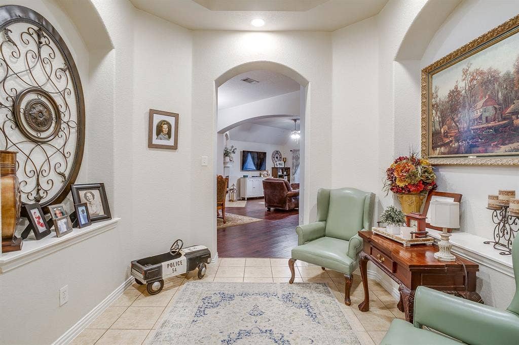 1316 Meadowlakes, Azle, TX 76020 Sitting room is a great space for your Christmas tree.