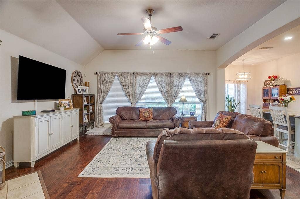 1316 Meadowlakes, Azle, TX 76020 Wood floors and ceiling fan.