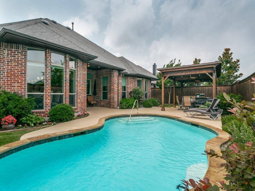 720 Hampshire Drive, Prosper, TX 75078 nicely landscaped pool area.