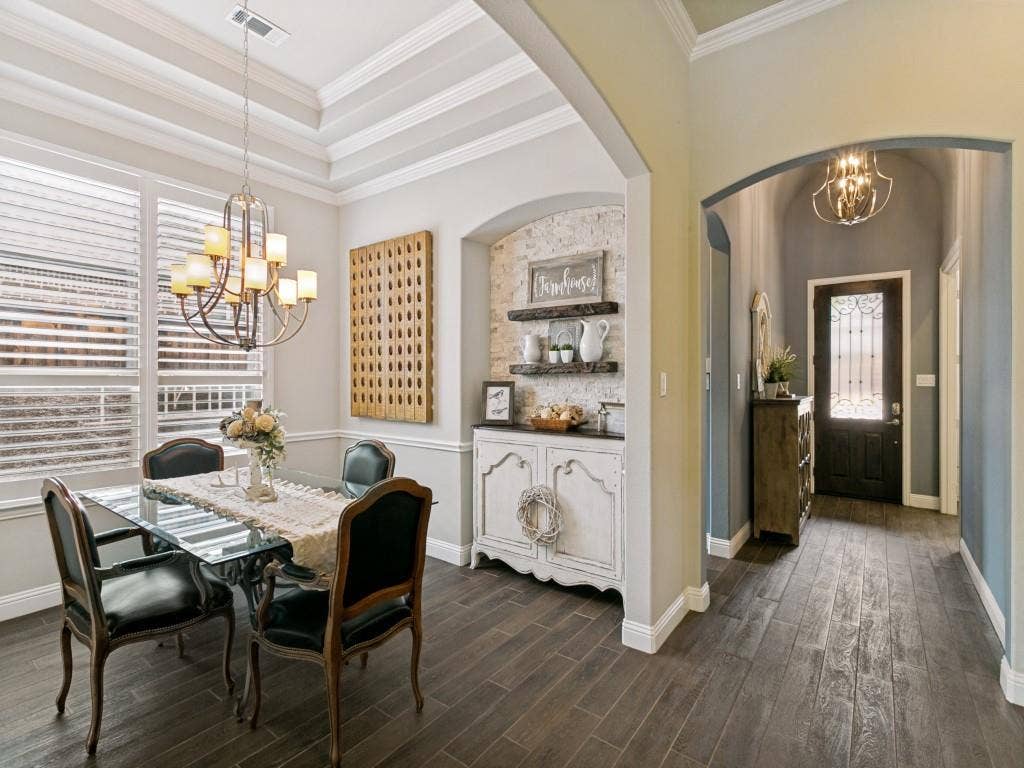 720 Hampshire Drive, Prosper, TX 75078 Formal dining room with recessed ceiling and decorative lighting.