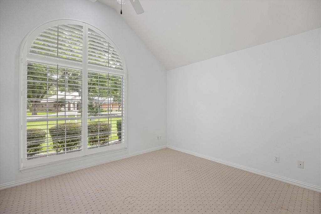 8709 S Monticello Circle, Granbury, TX 76049 3rd Bedroom - bright light, beautiful plantation shutters, large walk-in closet