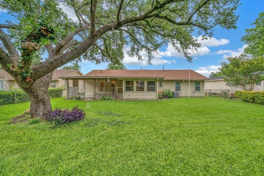 1112 N 63rd Street, Waco, TX 76710 Back Yard and House