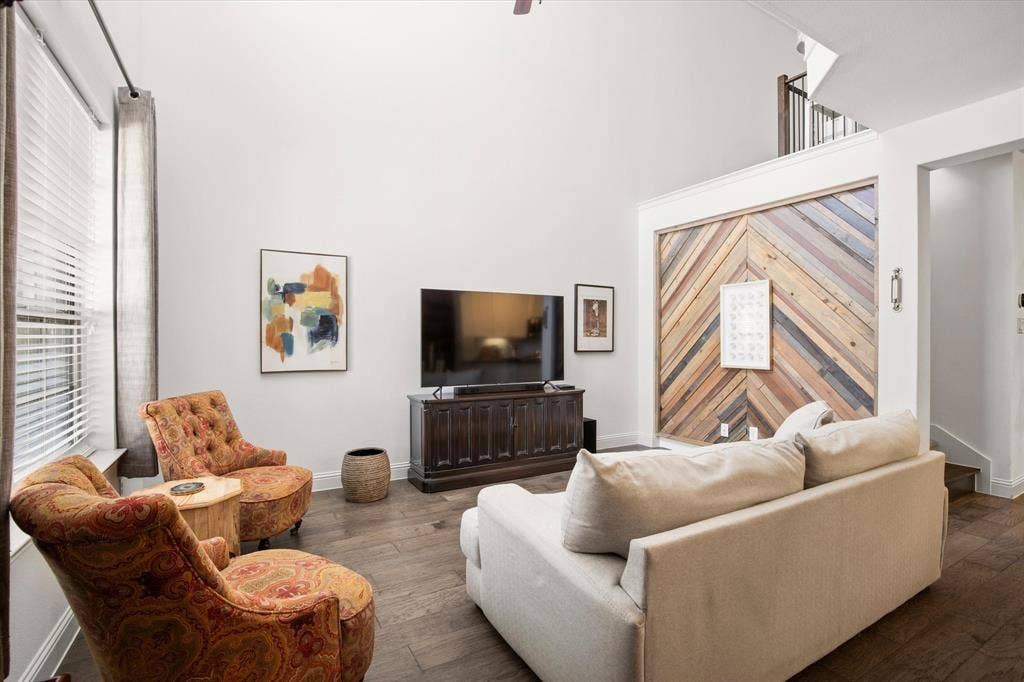 7221 Huckleberry Drive, McKinney, TX 75070 The accent wall creates a focal point for the room's decor.