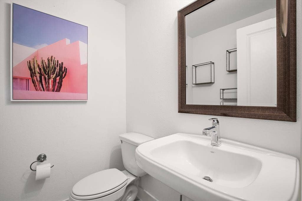 7221 Huckleberry Drive, McKinney, TX 75070 A first floor powder bath is perfect for guests.