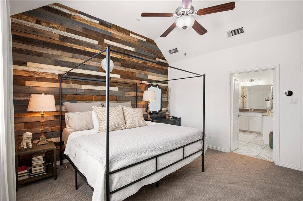 7221 Huckleberry Drive, McKinney, TX 75070 The accent wall theme is continued into the primary bedroom.