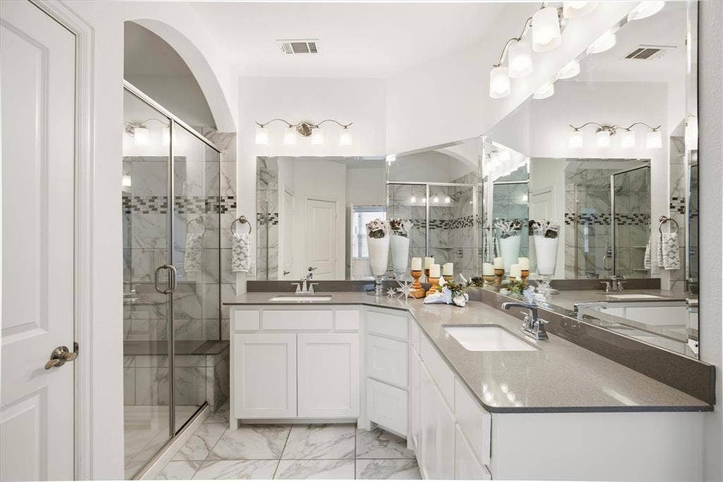 7221 Huckleberry Drive, McKinney, TX 75070 Counter space galore in the primary bath.