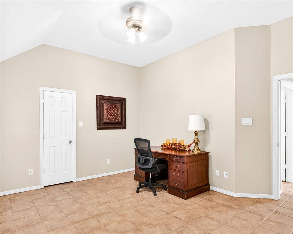 6005 Pin Oak Drive, McKinney, TX 75072 Vaulted ceiling with an attached ceiling fan and light fixture