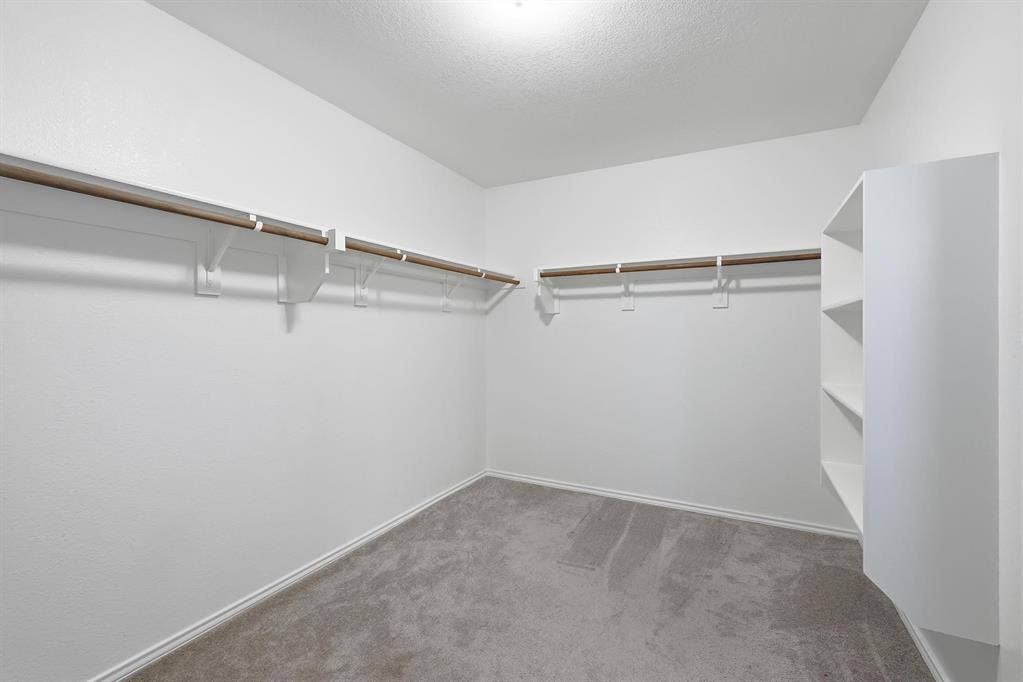 Huge walk in closet in the primary