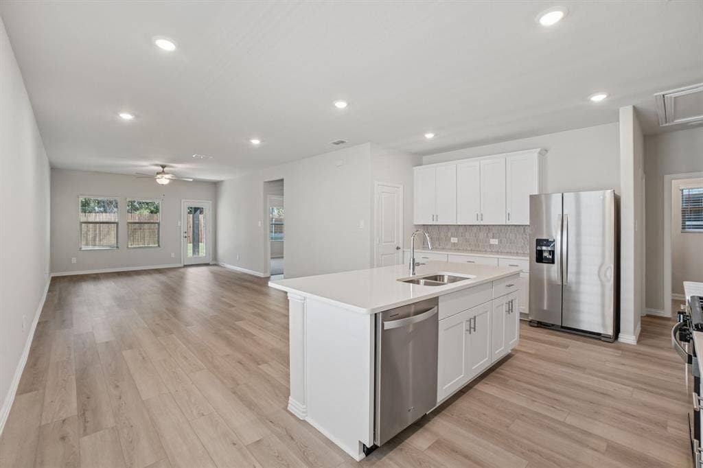 3056 Belton Drive, Farmersville, TX 75442 Photo is not of the actual home, but is an inspirational photo of builder’s model home and may depict options, furnishings, and/or decorator features that are not included.