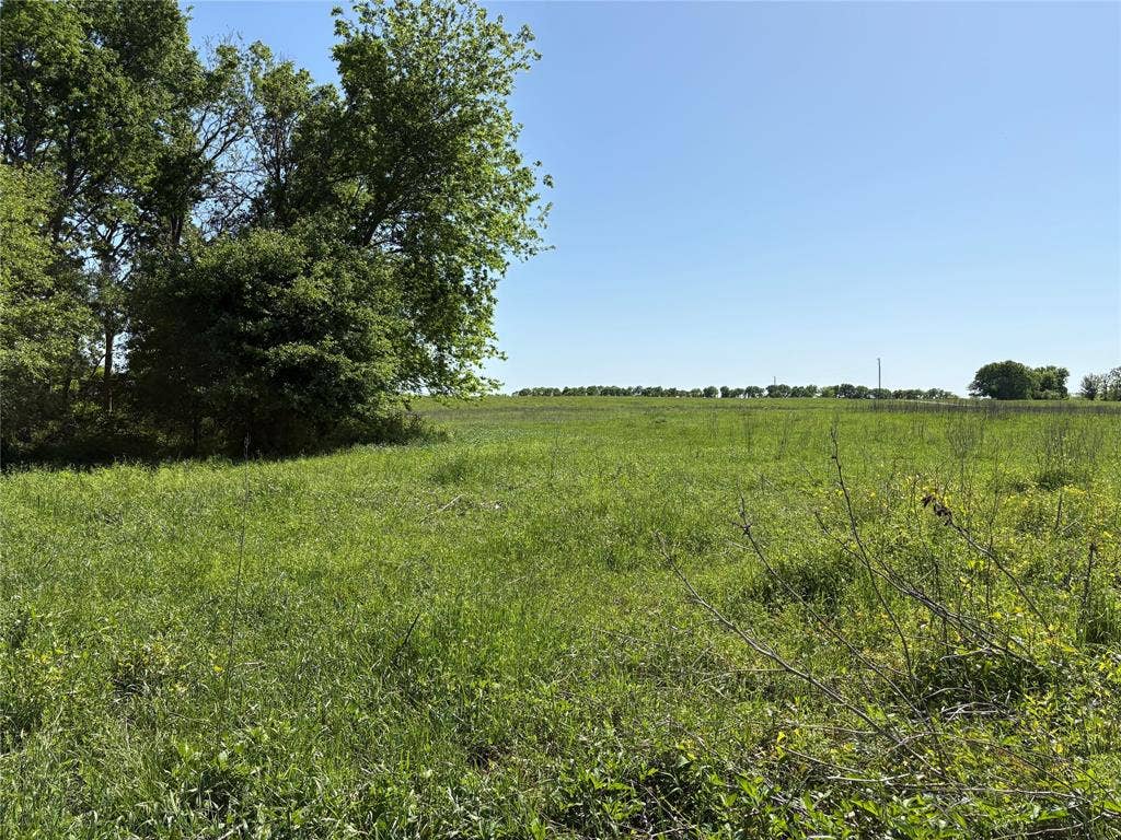 1500 Private Road 8496, Athens, TX 75832 Country living starts here with a beautiful barndominium-ready homesite in gated River Point.