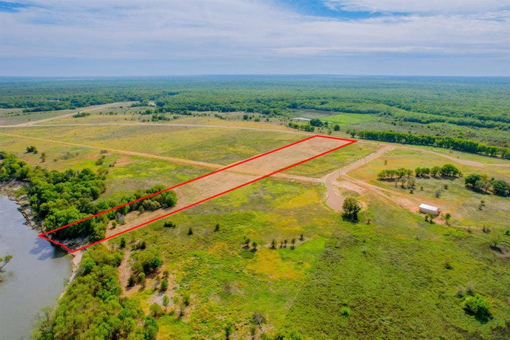 1500 Private Road 8496, Athens, TX 75832 Wide open Texas skies frame this peaceful 10-acre riverfront property.