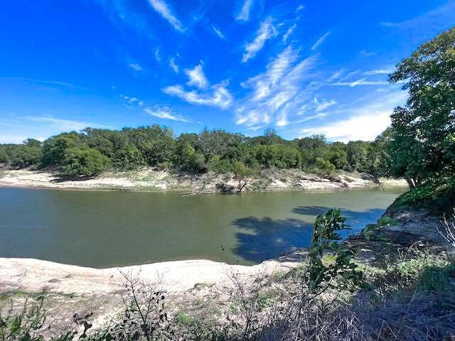 1500 Private Road 8496, Athens, TX 75832 Build your dream barndominium overlooking the Trinity River with plenty of room for animals and outdoor living.